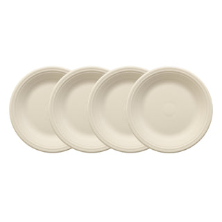 The Fiesta (FTC) Linen Set of 4 Classic Rim 10 1/2 Inch Dinner Plates, shown slightly overlapping on a white background, is ideal for daily meals or pairing with your favorite art deco dinnerware.