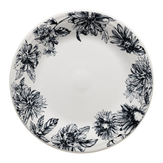 The Fiesta Botanical Floral Black Classic Rim 10 1/2 Inch Dinner Plate, made in USA, is round and white with intricate black botanical designs on the rim and a plain center.