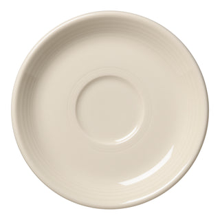 A New Retired Classic Rim 5 7/8 Inch Saucer by Fiesta, in Linen color, made in the USA. It is round with a central circular indentation and shown from above on a white background.