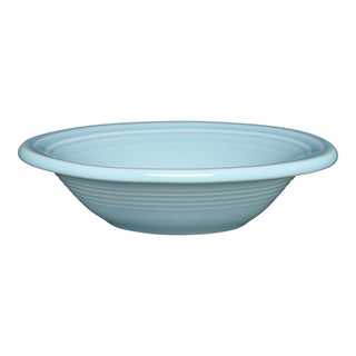 The Fiesta 6 1/2 Inch Stackable Cereal Bowl (11 OZ) in Sky is a light blue, lead-free ceramic bowl with a wide rim and subtle horizontal ridges, shown against a white background.