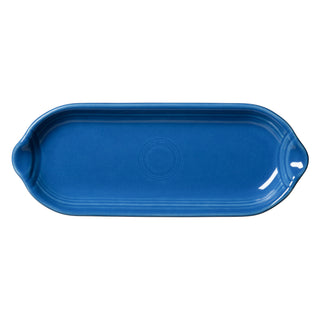 The Fiesta Appetizer Tray 9 1/2 Inch in Lapis features an oval blue ceramic design with small handles and raised edges—ideal as a versatile kitchen serving tray for any occasion.