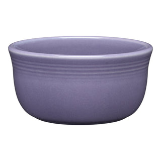 The Fiesta Lavender All-Purpose Gusto Bowl features a 6-inch, round ceramic design with a smooth finish, subtle horizontal rim ridges, and a 28 oz capacity, shown against a white background.