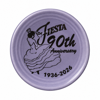 The Fiesta Lavender 90th Anniversary 3 Inch Mini Magnet Dinner Plate features a woman in a flowing dress and Fiesta 90th Anniversary 1936-2026—perfect for collectors and fans of Fiesta dinnerware.
