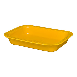 The Fiesta New Retired Rectangular 9x13 Inch Baker, 3 Quart, in daffodil yellow features rounded corners, lightly raised edges, and a shallow plastic design, shown on a white background.