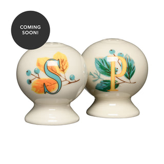 Add a festive touch to your table with the Autumn Fields 2 5/8 Inch Salt and Pepper Shaker Set by Fiesta. Featuring cream-colored ceramic with autumn leaf and berry motifs and marked “S” and “P,” this charming set is the perfect addition to your Fall Tableware collection. A black circle in the upper left corner displays white text reading “COMING SOON!”.