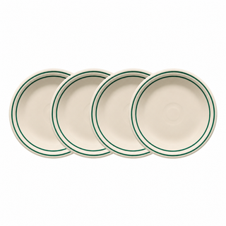 Four Fiesta Americana Jade Band Classic Rim 9-Inch Luncheon Plates, crafted in the USA, are arranged in a slightly overlapping row on a white background. Each cream-colored plate features subtle green double rings accenting the border, adding a timeless touch.