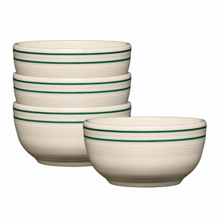 Four beige Fiesta Americana Jade Bands bistro coupe bowls (5 1/2 inch, 22 oz) with two green stripes near the rim are arranged on a white background. Three bowls from the lead-safe china set are neatly stacked, while one is placed slightly apart in the front.