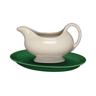 The Fiesta Factory Direct Sauceboat & Small Platter Bundle features a cream-colored gravy boat with handle and spout, paired with a round green platter, shown against a white background.