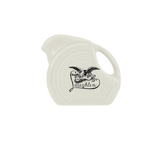 Cream-colored ceramic pitcher featuring an old-style black illustration of an eagle and lion above the cursive word “Laughlin.”