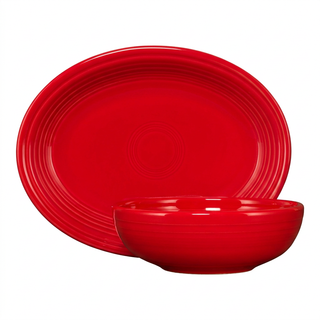 Bright red Large Oval Platter and matching deep, round Large Bistro Coupe Bowl.
