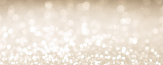 A soft, abstract background featuring out-of-focus, shimmering white and light beige bokeh lights, creating a sparkling and elegant effect.